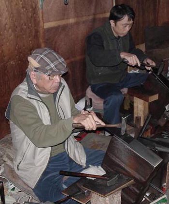 Mr. Shunsaku Kanzawa, Master Saw Maker, and a Journeyman Saw Maker